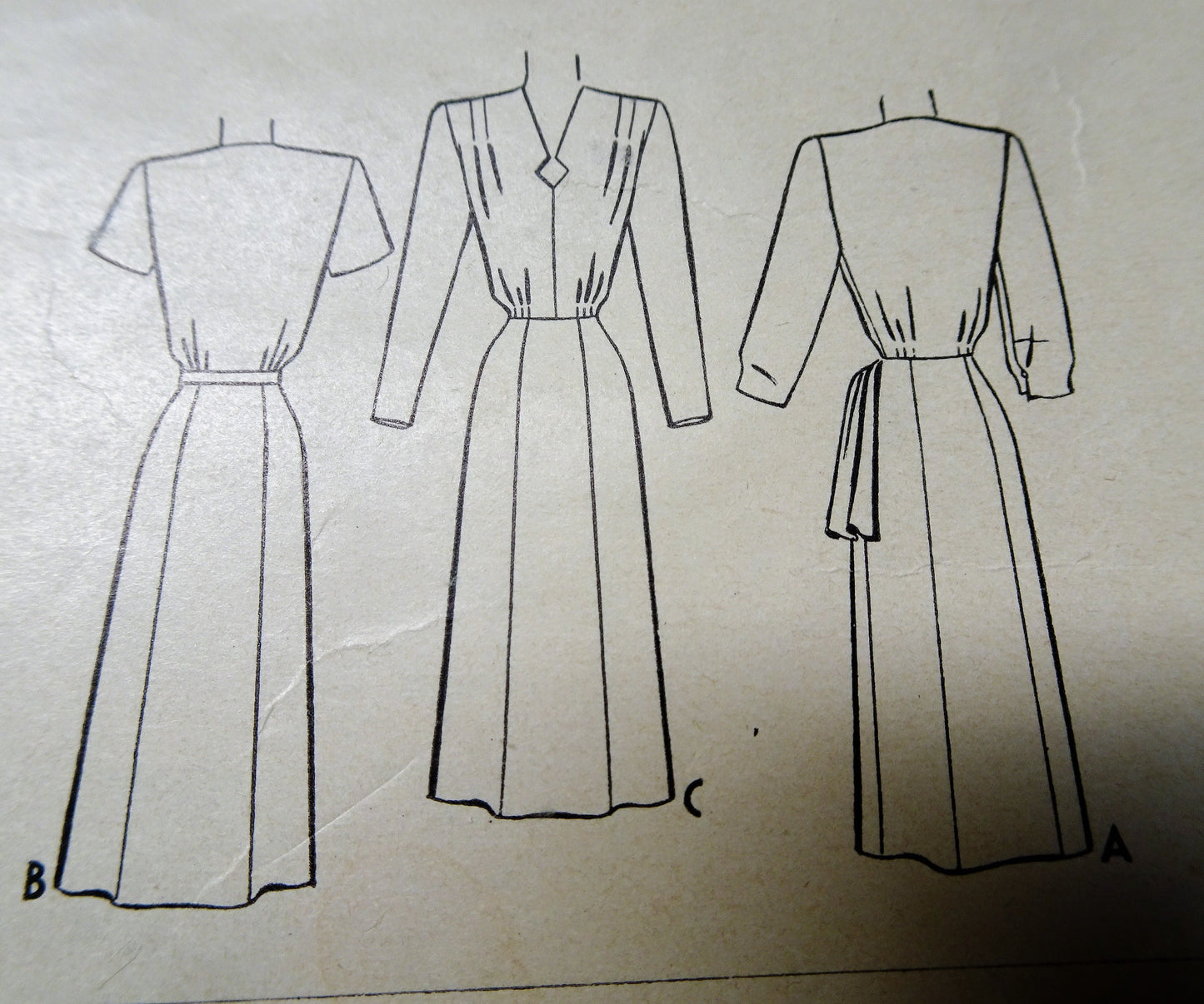 1940s FILM NOIR Style Dress Pattern McCALL 6736 Eye Catching Key Hole Neckline, Front Flounce Day or Dinner Dress Bust 34 Vintage Sewing Pattern